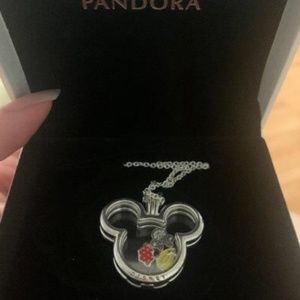 Brand new Disney locket necklace with 3 charms